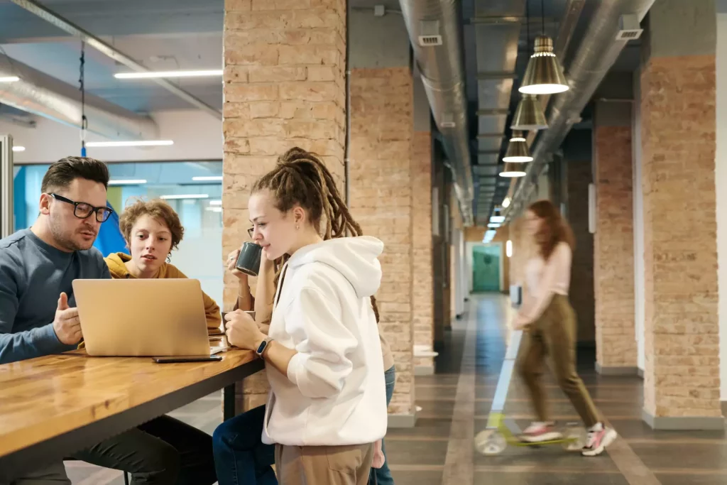 three people discussing about work
