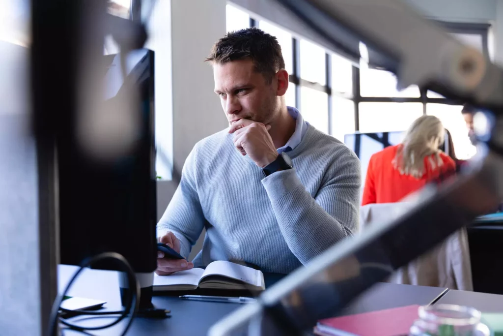 Man looking at his computer screen