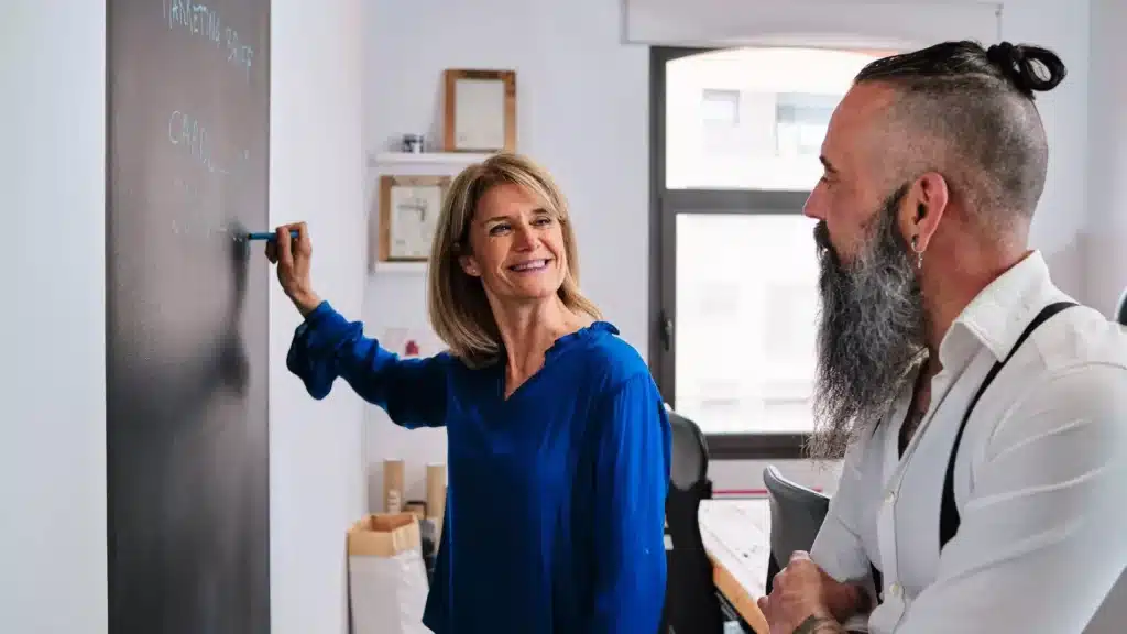 Two people in the office making a planning