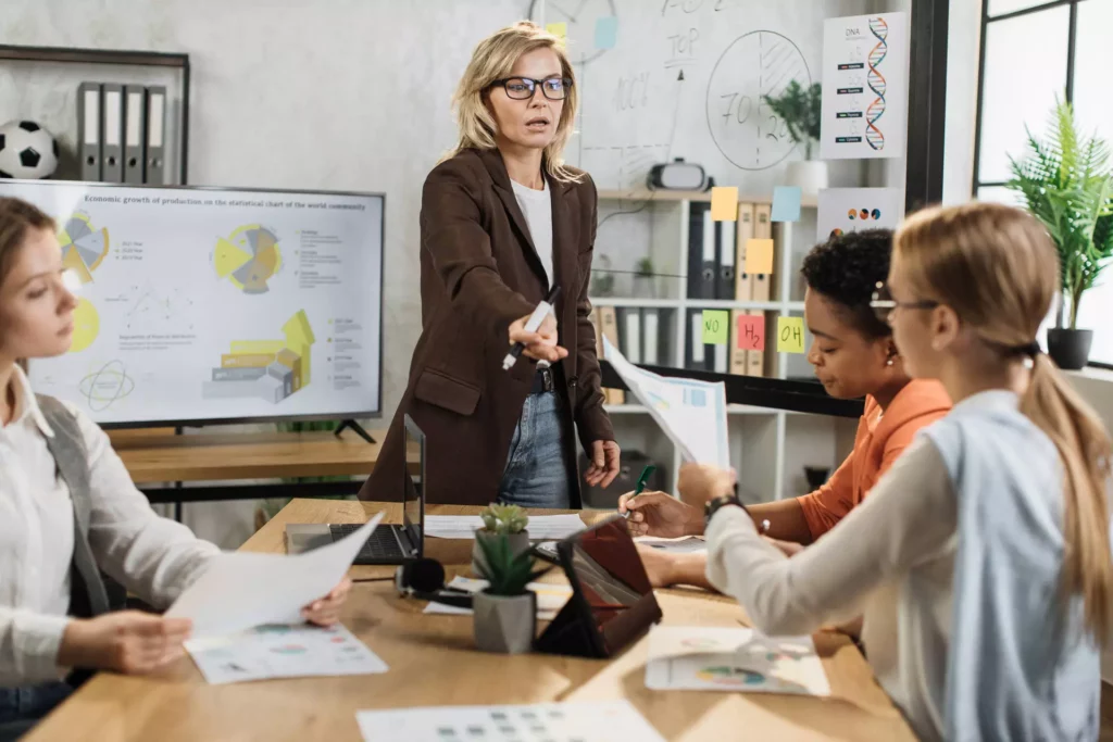Female marketing manager leading a team meeting